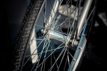 detail of bicycle rays, selective focus on rotation mechanism
