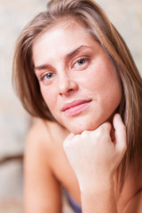 portrait of a young half naked woman with dreamy face
