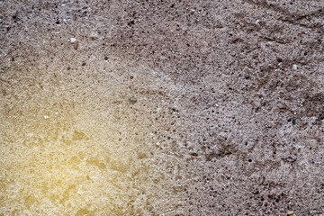 Grunge wall cement texture in sunbeam light , plaster background.