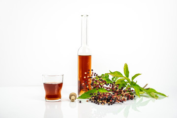 Fresh elderberries with elderberry syrup 