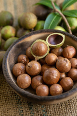 Macadamia nuts on sacks in natural light