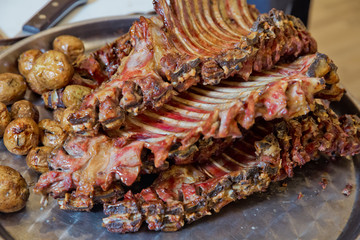 Roasted meat over an open fire, cooked in a special way.Barbecue is prepared of lamb or sheep meat and processed by slasher.