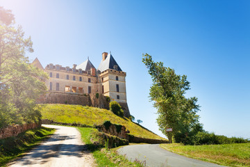Fototapeta na wymiar Road to the Chateau de Biron castle in France