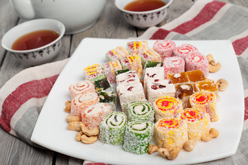 Turkish delight on a wooden table.