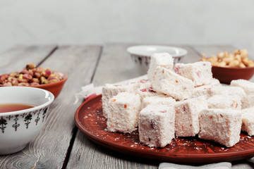 Turkish delight on a wooden table.