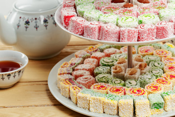 Turkish delight on a wooden table.