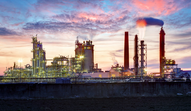 Petrochemical plant at night, oil and gas industrial