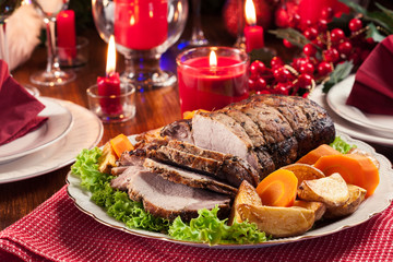 Roasted pork loin with baked potatoes