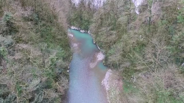 Drone view of canyon, rocks and Khosta River in Yew and Box-tree Grove in spring day, Sochi, Russia
