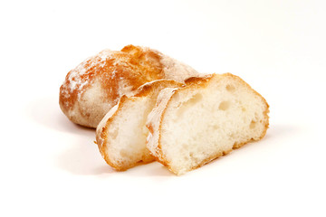 Sliced fresh bread on white