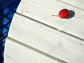 Plum is on the white table