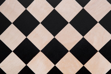 Fototapeta premium Top view on the black and white checkered texture, chessboard