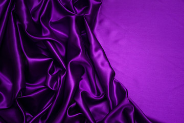 Ripple of violet fabric drapery, Beautiful purple silk trendy and design, Elegant crumpled satin for background and abstract