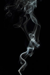  White smoke texture on black background
