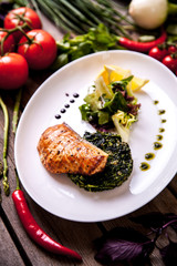 Baked Salmon Steak with Spinach and Lemon Slice