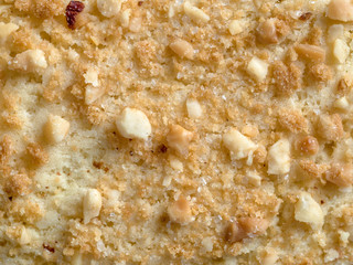 Shortbread cookies with nuts pattern.Close up. Sand ring with nuts isolate, white background. Traditional Russian baking-shortcrust ring with peanuts pattern texture.Top view or flatlay