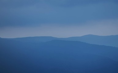 Morning landscape. Silhouette of mountain ranges