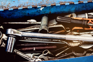 Cose-up of old toolbox. Toolset with interior compartments to keep wrenches for repair work.