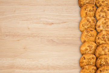 Cookies with peanut on old wooden table.