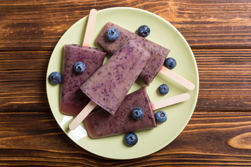 Popsicle with blueberries and yogurt