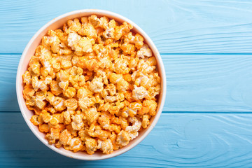 Yellow cheese popcorn in bowl