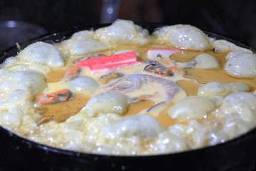 shrimp and shell fried with milk powder in the pan.