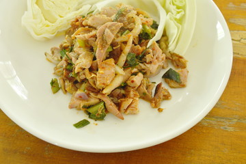 spicy barbecue chicken Thai salad eat with cabbage on plate