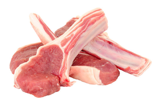 Group of fresh raw lamb cutlets isolated on a white background