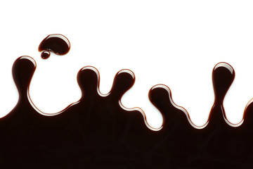 Chocolate syrup on white background