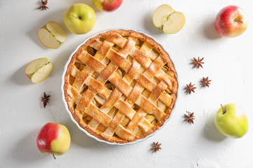Composition with delicious apple pie on light background