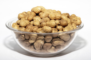 Peanuts isolated on white background. Peanut macro.