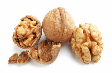 Tasty walnuts on white background