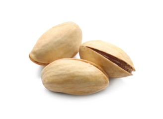 Tasty pistachio nuts on white background