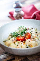 Andalusian fish, saffron rice with vegetables