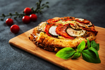 Pie Tomato Zucchini Mozzarella, pesto and virgin olive oil