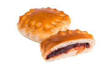 baked pies with sweet filling, cut, dark berry jam, jam,