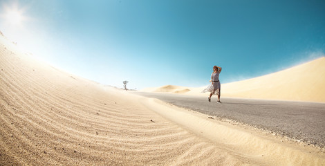 Fototapeta premium beautiful fashion woman walk cross desert