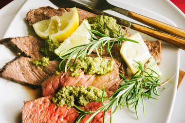Cut beef served with Genoese pesto