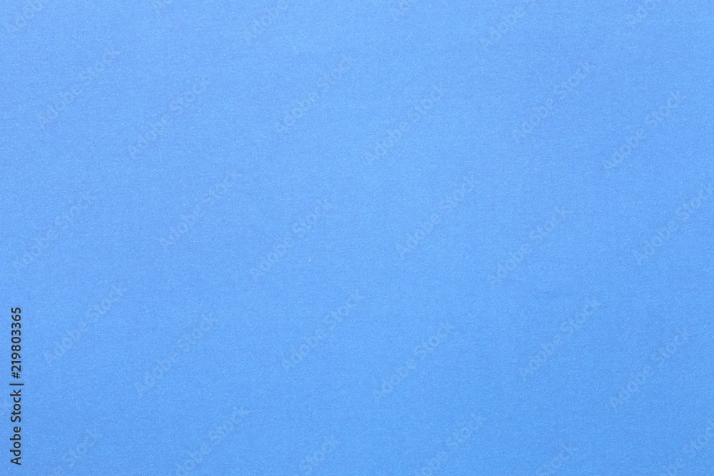 Wall mural surface of blue art paper background.