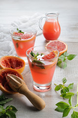 Cocktail of grapefruit and lemon basil