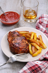 pork steak on dice with potatoes
