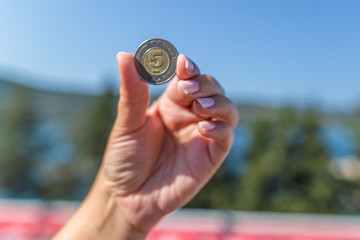 Bosnian coins in hand