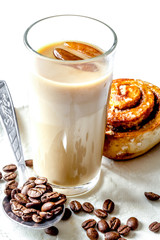 coffee with ice in glass on white background