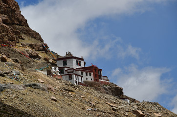 Ancient Buddhist monastery Chuku Gompa on the mountainside opposite the southern face of mount...