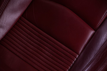 Detail shot of dark red car seat