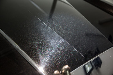 Polished car surface before and after