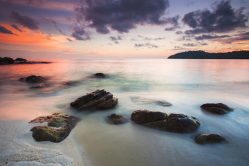 Fototapeta na wymiar Beautiful View of Sunset at Koh Lipe Island,Thailand.Soft Focus,Blur due to Long Exposure.Visible Noise due to High ISO.