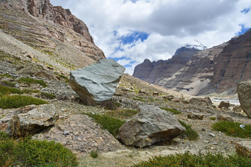 One of the geoglyphs against the southern face of mount Kailas (Kailash) in cloudy weather. Tibet,...