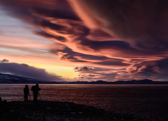 Natural miracle lenticular clouds at sunset, background