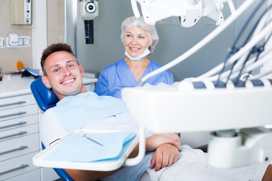 Man in dental chair waiting for examination